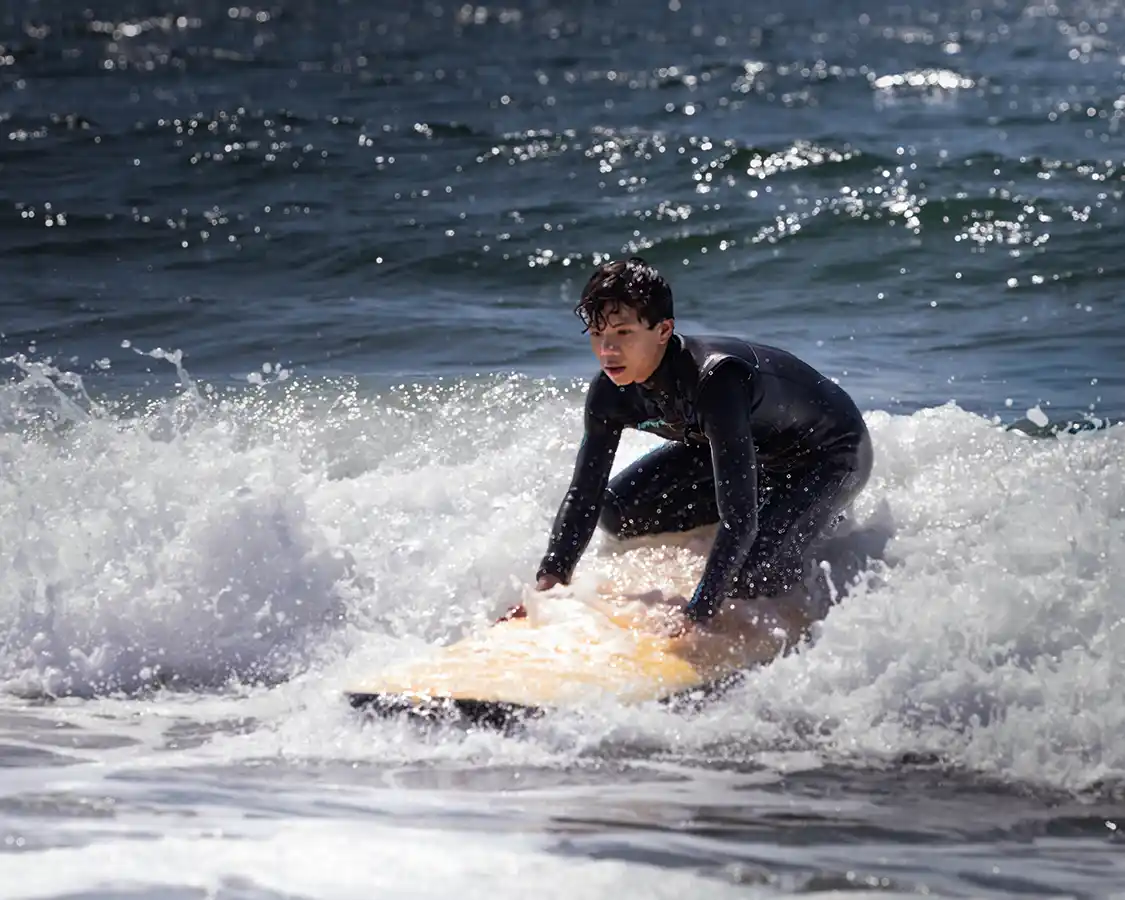 Dylan Wagar surfing at Lawrencetown Beach East Coast Surf School