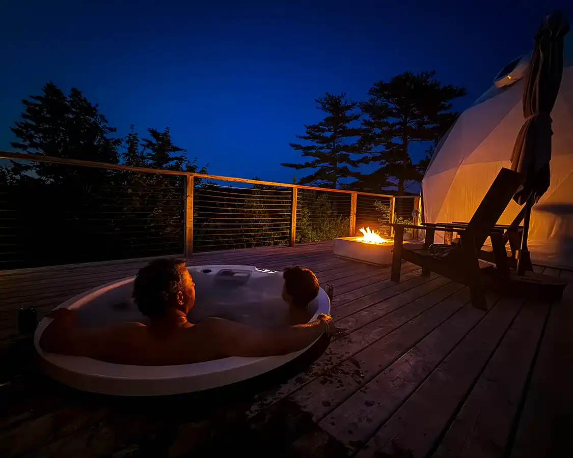 Kevin Wagar and his son watch the stars from a hot tub at Nalu Retreat near Halifax