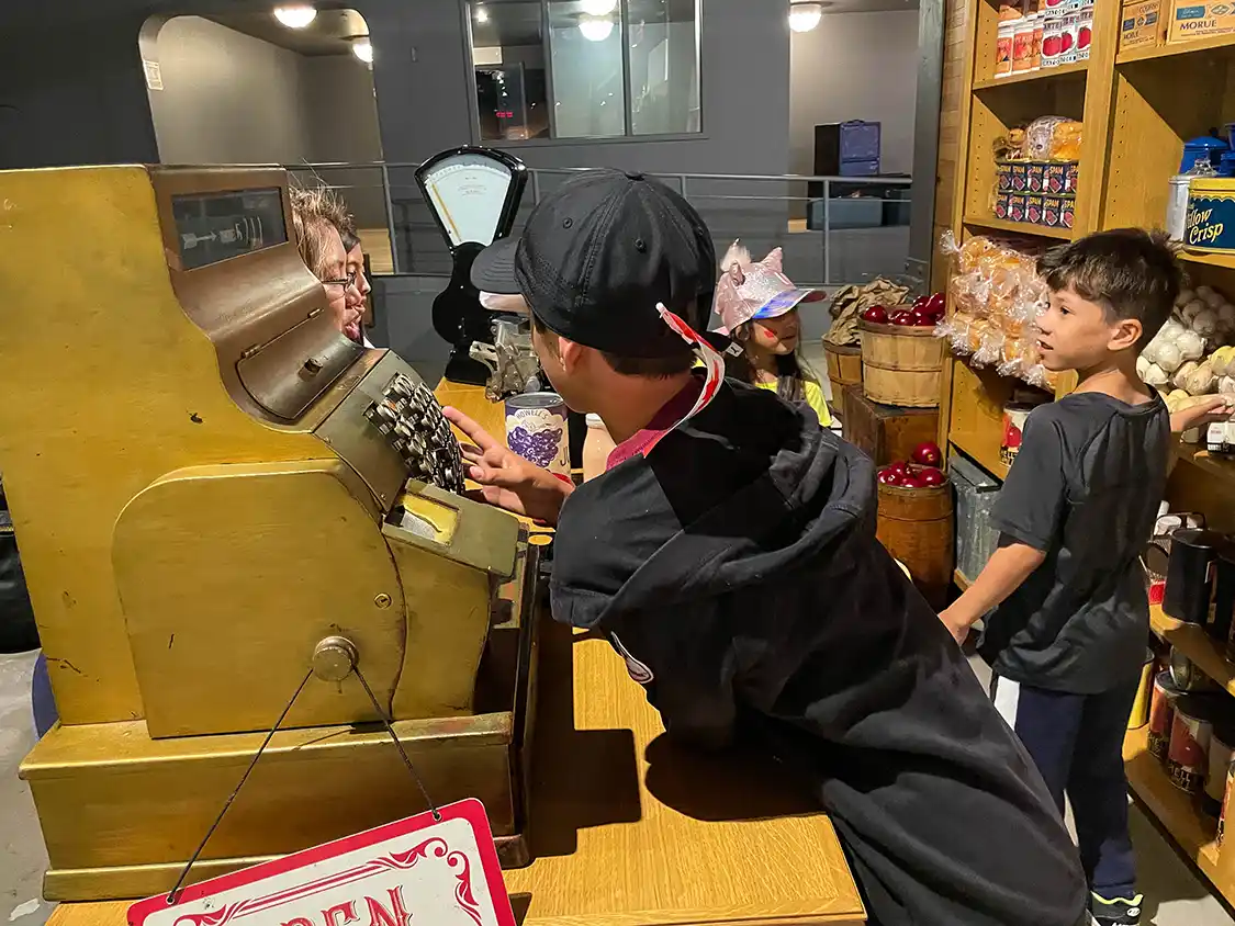 Boys try out the interactive exhibits a the Pier 21 Museum of Immigration in Halifax
