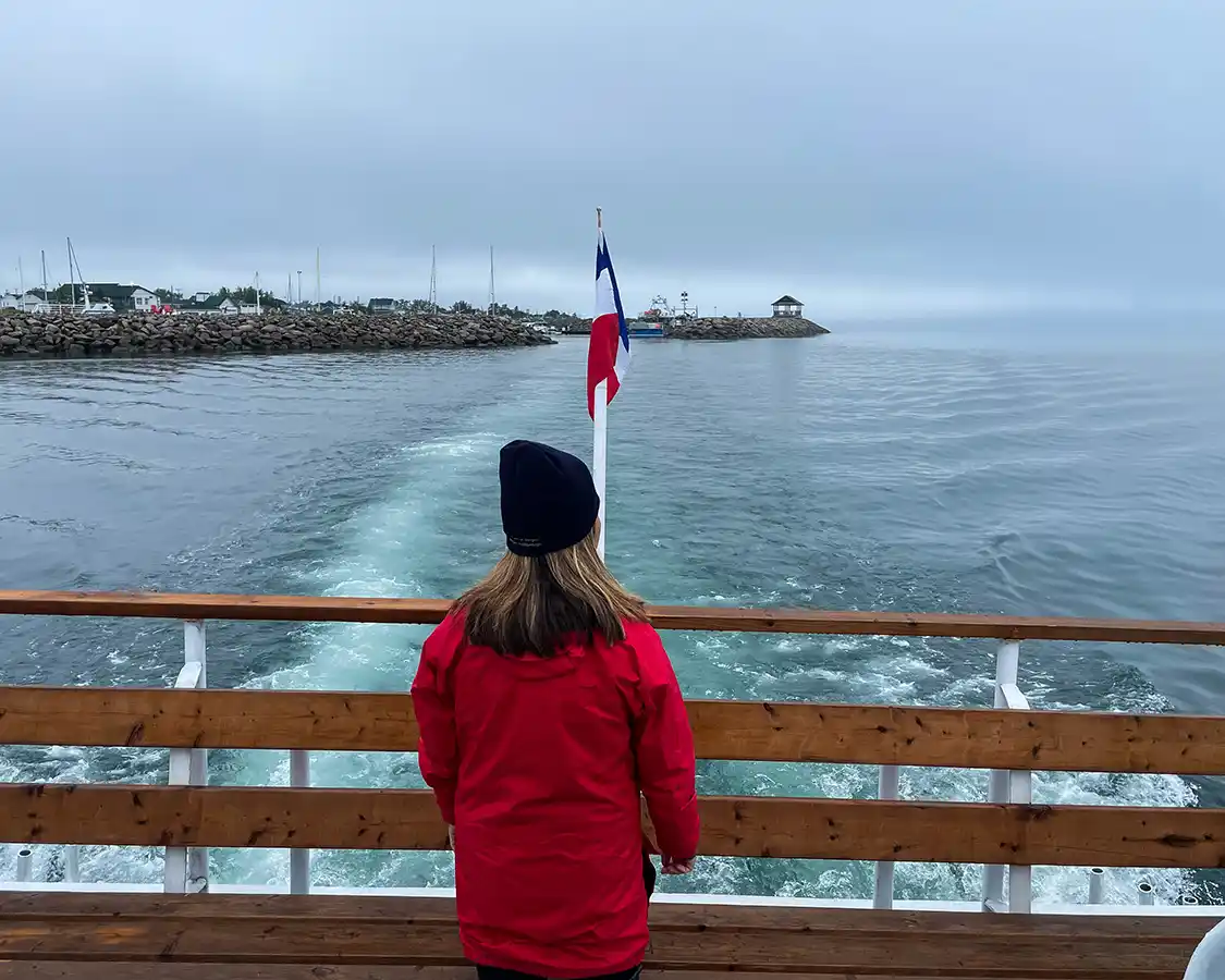 Christina Wagar watches Havre-Saint-Pierre fade into the distance on a cruise to the Mingan Archipelago islands