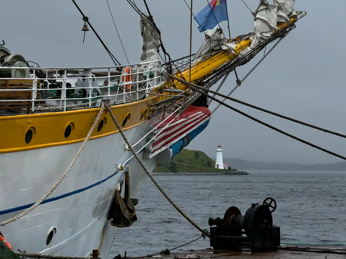 Georges Island seen through the mast of a tall ship in the Halifax Harbour