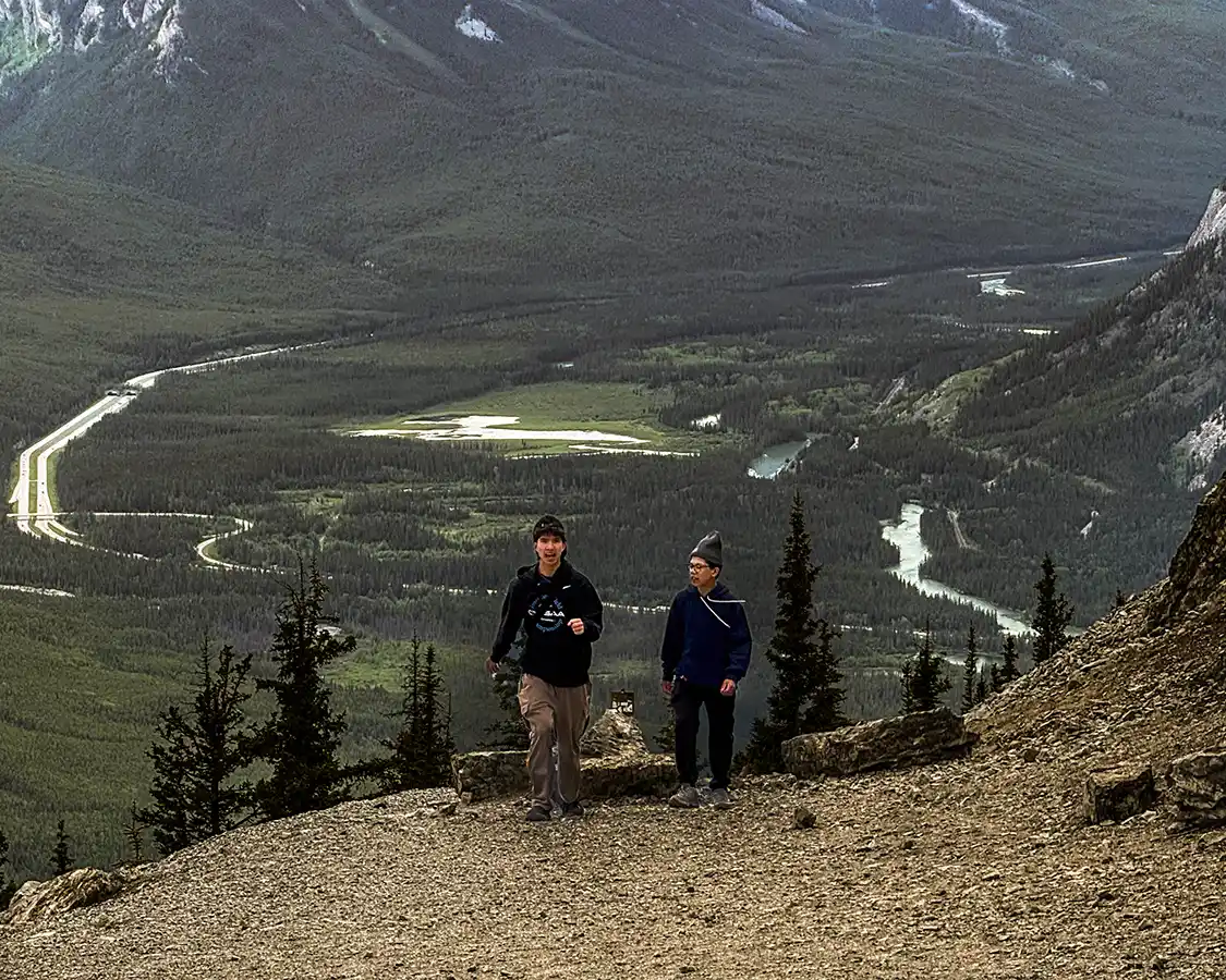 Two teenagers hiking Sulphur Mountain Banff