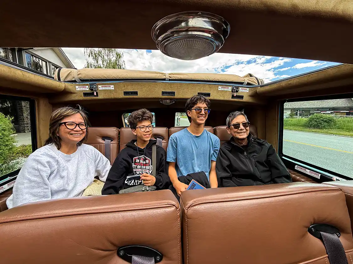 Wagar boys with their grandparents in the Open Top Tour Banff