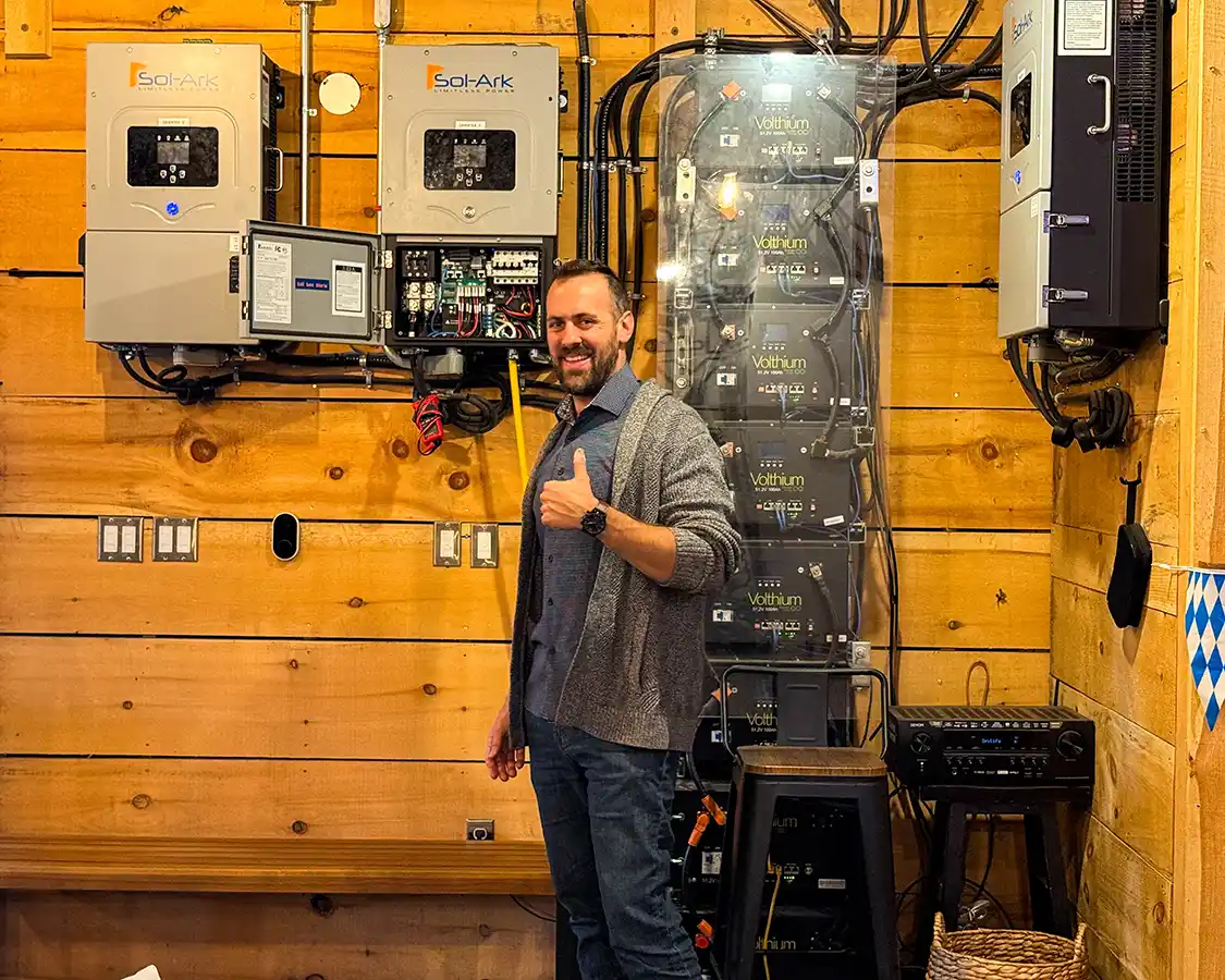 Phil Audet of ArBru Solar Brewing shows off his solar setup